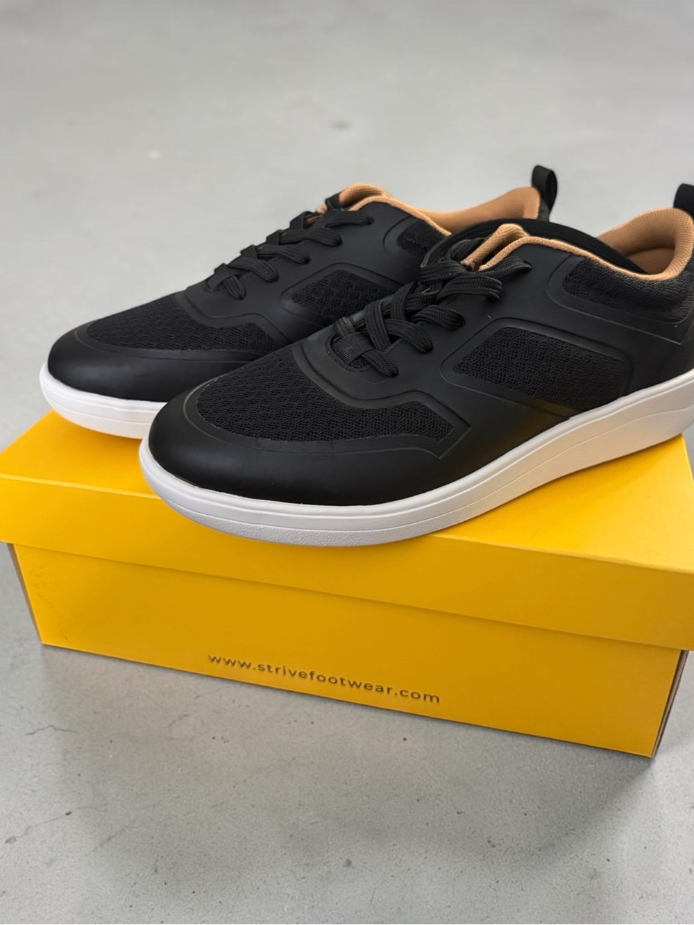 NIB Strive Sneakers